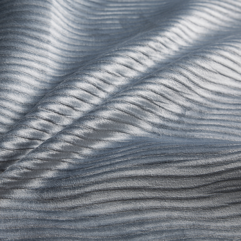 A Wrap Knitting Fabric egy textil szerkezet, amely több fonalból készült hurkokból áll